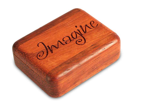 Top View of a 2" Flat Narrow Padauk with laser engraved image of Imagine
