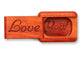 Top View of a 2" Flat Narrow Padauk with laser engraved image of Love You!