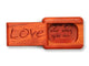 Top View of a 2" Flat Narrow Padauk with laser engraved image of Love You Just The Way You Are