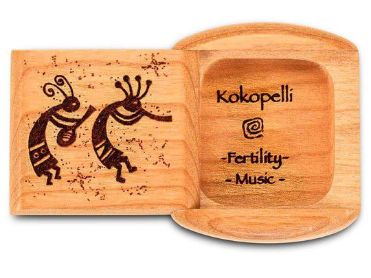Top View of a 2" Flat Wide Cherry with laser engraved image of Kokopelli Fertility Music