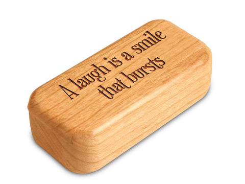 Top View of a 3" Med Narrow Cherry with laser engraved image of Quote -A laugh is