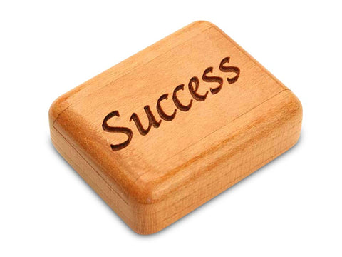 Top View of a 2" Flat Narrow Cherry with laser engraved image of Success