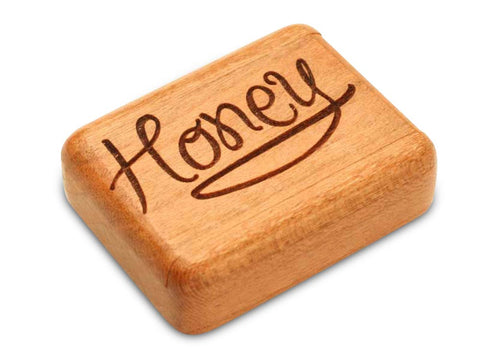 Top View of a 2" Flat Narrow Cherry with laser engraved image of Honey