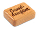 Top View of a 2" Flat Narrow Cherry with laser engraved image of Granddaughter