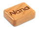 Top View of a 2" Flat Narrow Cherry with laser engraved image of Nana