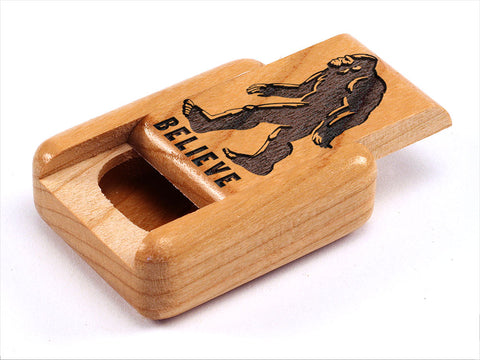 Top View of a 2" Flat Narrow Cherry with laser engraved image of Bigfoot/Believe