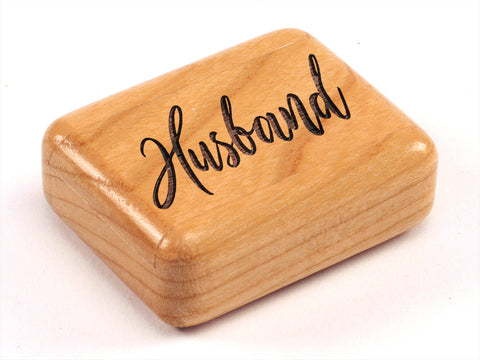 Top View of a 2" Flat Narrow Cherry with laser engraved image of Husband