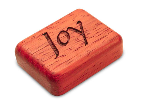 Top View of a 2" Flat Narrow Padauk with laser engraved image of Joy