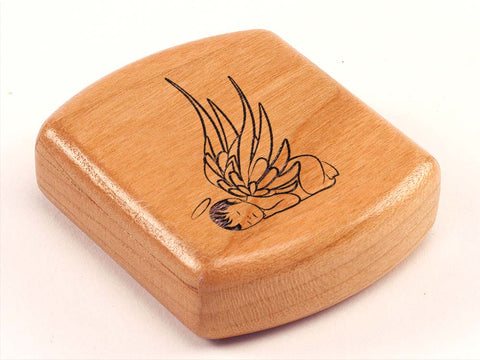 Top View of a 2" Flat Wide Cherry with laser engraved image of Baby Angel