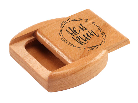 Top View of a 2" Flat Wide Cherry with laser engraved image of He is Risen