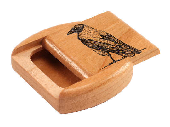 Top View of a 2" Flat Wide Cherry with laser engraved image of Crow