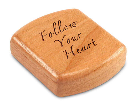 Top View of a 2" Flat Wide Cherry with laser engraved image of Quote -Follow Your Heart