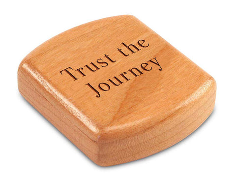 Top View of a 2" Flat Wide Cherry with laser engraved image of Quote -Trust the Journey