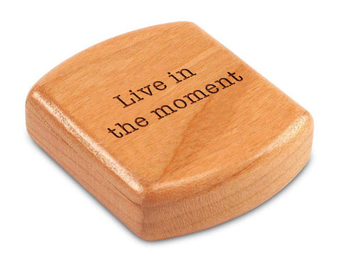 Top View of a 2" Flat Wide Cherry with laser engraved image of Quote -Live in the moment