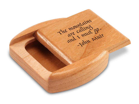 Top View of a 2" Flat Wide Cherry with laser engraved image of Quote -John Muir Mountains