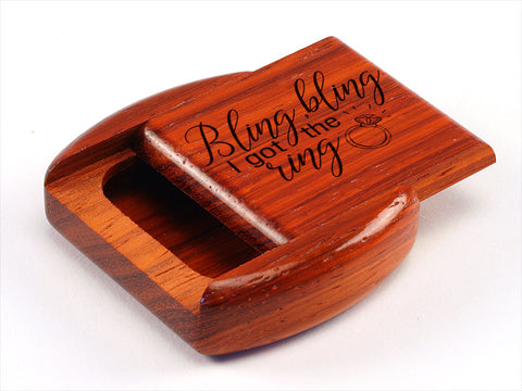 Top View of a 2" Flat Wide Padauk with laser engraved image of Bling Bling I Got the Ring