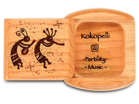 Top View of a 2" Flat Wide Cherry with laser engraved image of Kokopelli Fertility Music