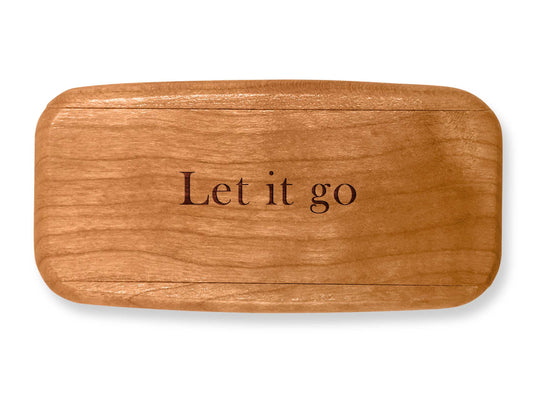 Top VIew of a 4" Med Wide Cherry with laser engraved image of Quote -Let It Go