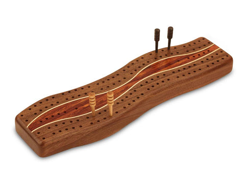 Top View with Pegs of a Walnut Center Wave Cribbage Board