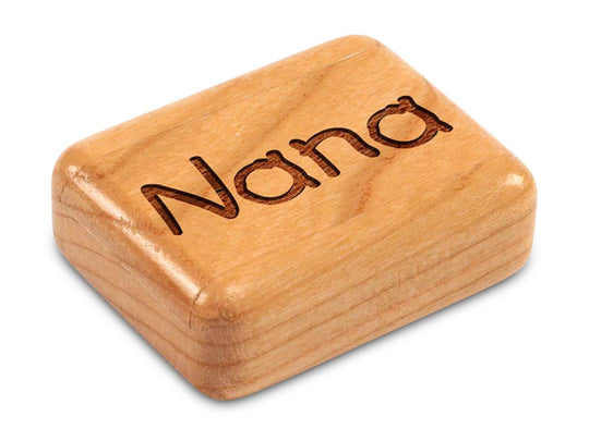 Top View of a 2" Flat Narrow Cherry with laser engraved image of Nana