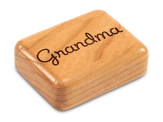 Top View of a 2" Flat Narrow Cherry with laser engraved image of Grandma