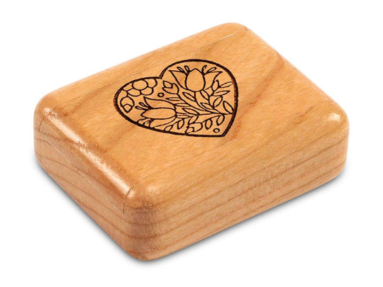 Top View of a 2" Flat Narrow Cherry with laser engraved image of Floral Heart