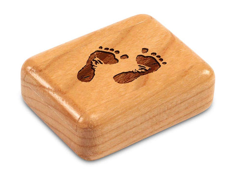 Top View of a 2" Flat Narrow Cherry with laser engraved image of Footprints