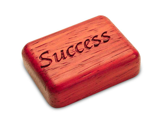 Opened View of a 2" Flat Narrow Padauk with laser engraved image of Success