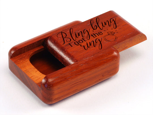 Opened View of a 2" Flat Narrow Padauk with laser engraved image of Bling Bling I Got the Ring