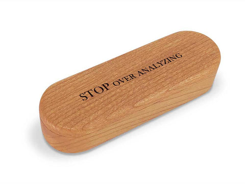 Top View of a Snap-Lid Mantra with laser engraved image of Stop over analyzing