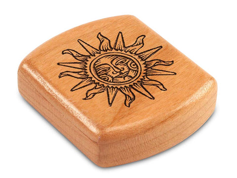 Top View of a 2" Flat Wide Cherry with laser engraved image of Sun