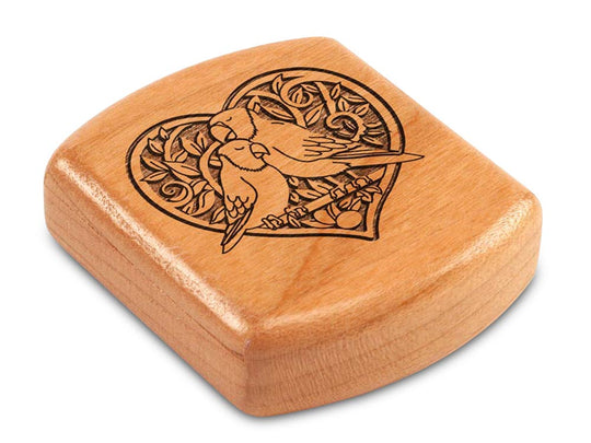 Top View of a 2" Flat Wide Cherry with laser engraved image of Birds in Love