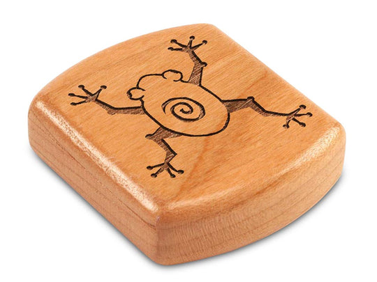 Top View of a 2" Flat Wide Cherry with laser engraved image of Tree Frog