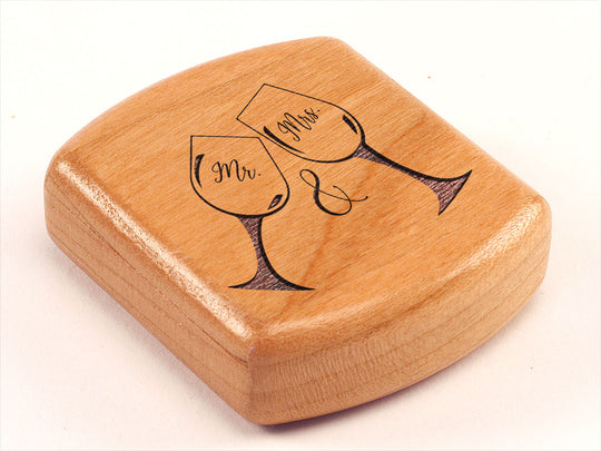 Top View of a 2" Flat Wide Cherry with laser engraved image of Mr. and Mrs. Wine Glasses