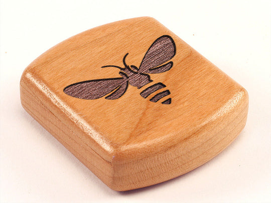 Top View of a 2" Flat Wide Cherry with laser engraved image of Bee Icon