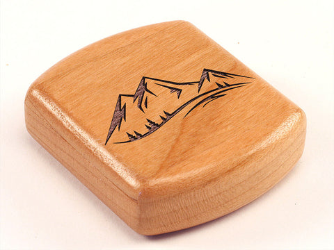 Top View of a 2" Flat Wide Cherry with laser engraved image of Mountains