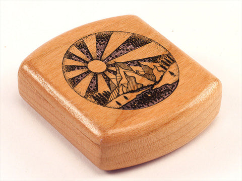 Top View of a 2" Flat Wide Cherry with laser engraved image of Mountains in Circle