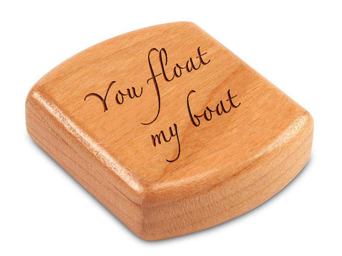 Top View of a 2" Flat Wide Cherry with laser engraved image of Quote -You float my boat