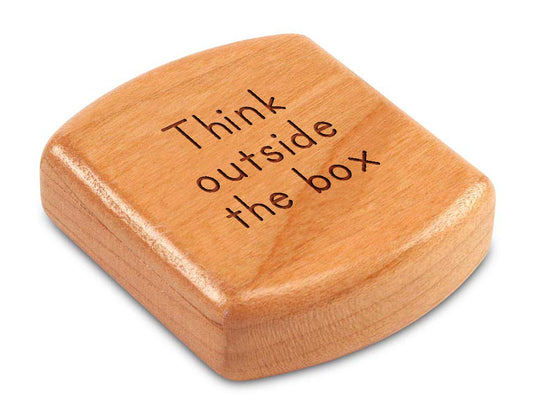 Top View of a 2" Flat Wide Cherry with laser engraved image of Quote -Think outside box