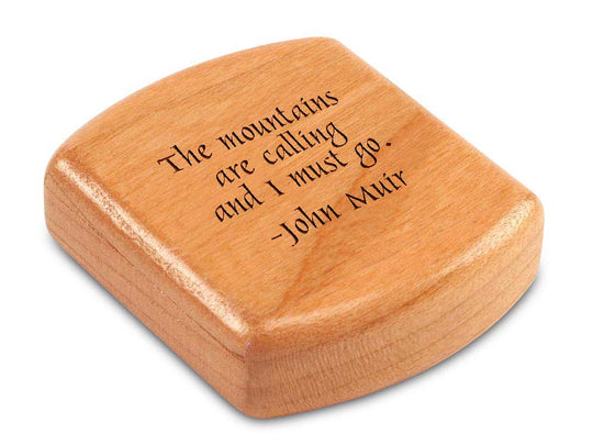 Top View of a 2" Flat Wide Cherry with laser engraved image of Quote -John Muir Mountains