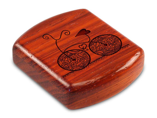 Top View of a 2" Flat Wide Padauk with laser engraved image of Heart Bike