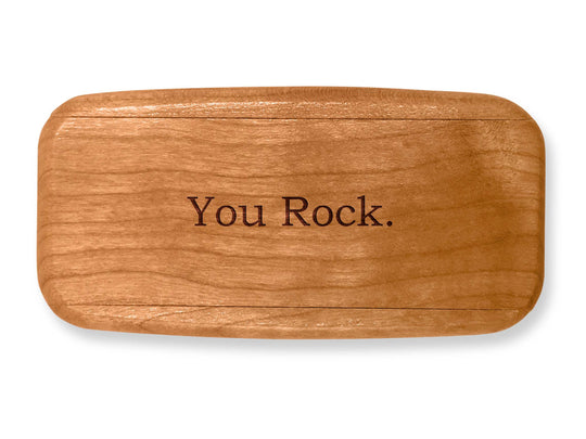 Top VIew of a 4" Med Wide Cherry with laser engraved image of Quote -You Rock.