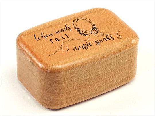 Top View of a 3" Tall Wide Cherry with laser engraved image of Headphones When Words Fail