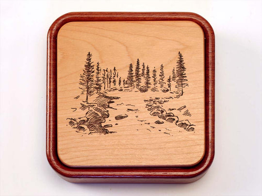 Top View of a Terra Flip-Top with laser engraved image of Mountain River Scene